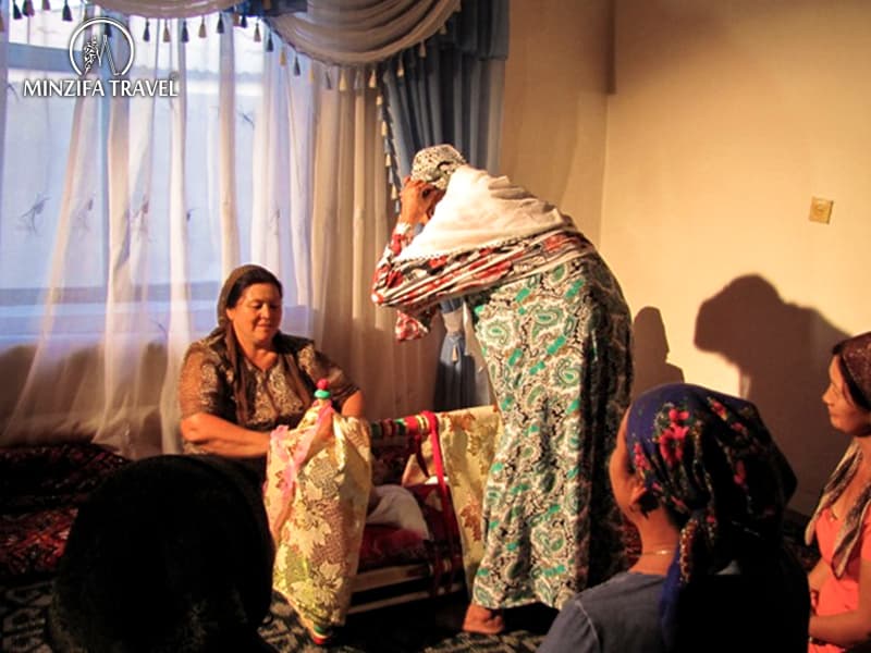 Beshik-tui - the first swaddling of a baby